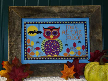 Owl At The Moon