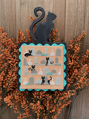 Cats in The Graveyard